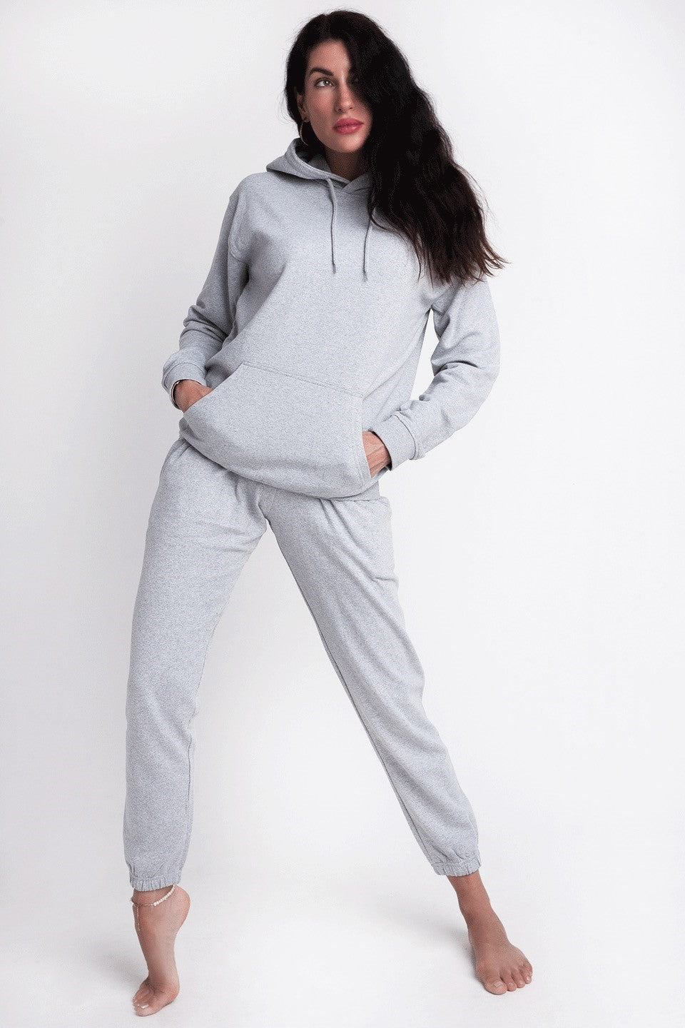 Recycled Cotton Hoody - Grey on model with hands in the pockets