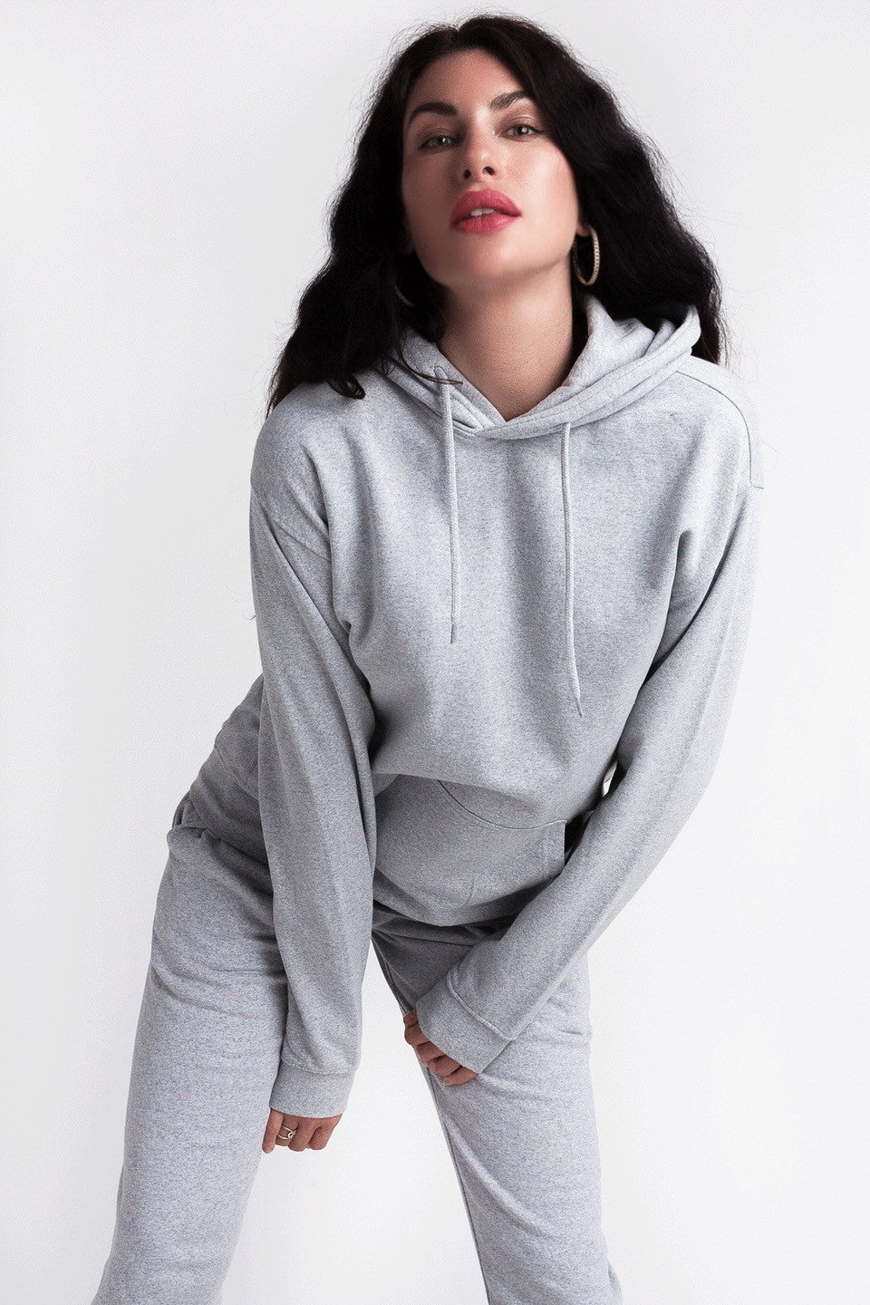 Recycled Cotton Hoody - Grey on model with hands on inner thigh